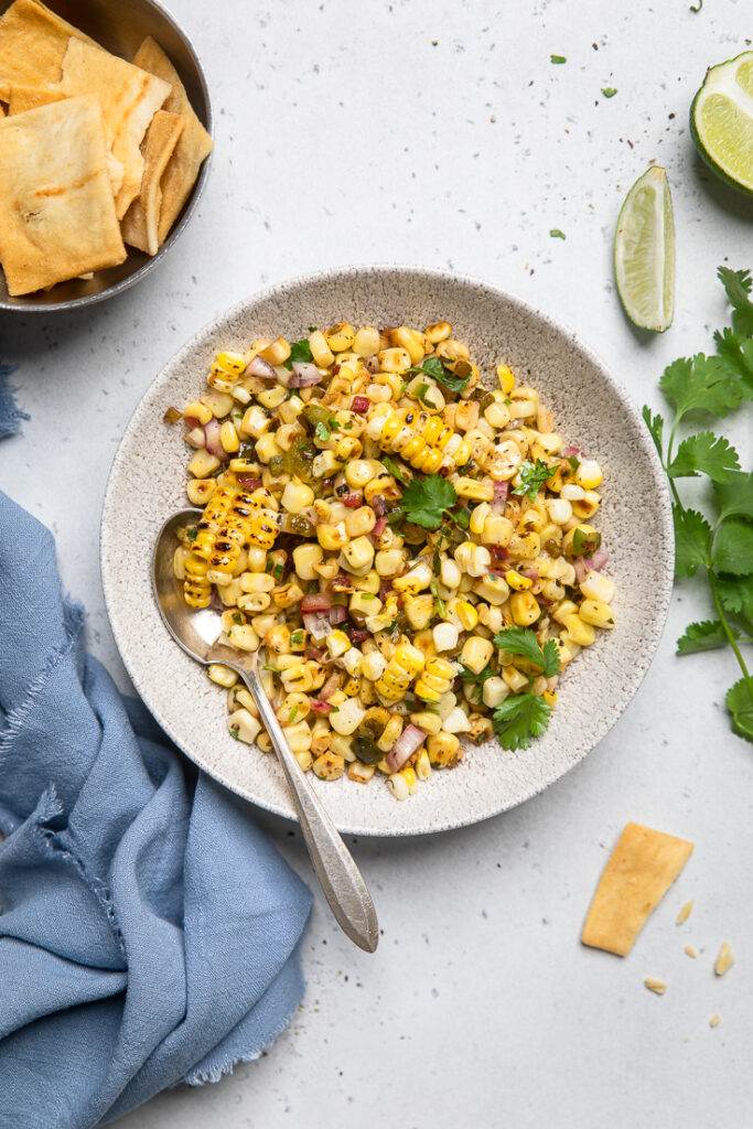 Copycat chipotle roasted corn salsa in a bowl. 