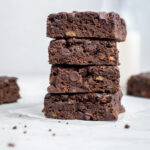 A stack of four vegan zucchini brownies.