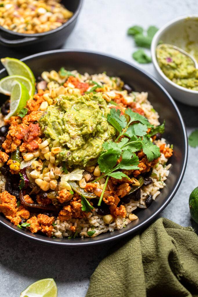 A large burrito bowl with copycat Chipotle ingredients. 