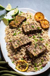 authentic Jamaican jerk tofu served over Jamaican rice and peas.