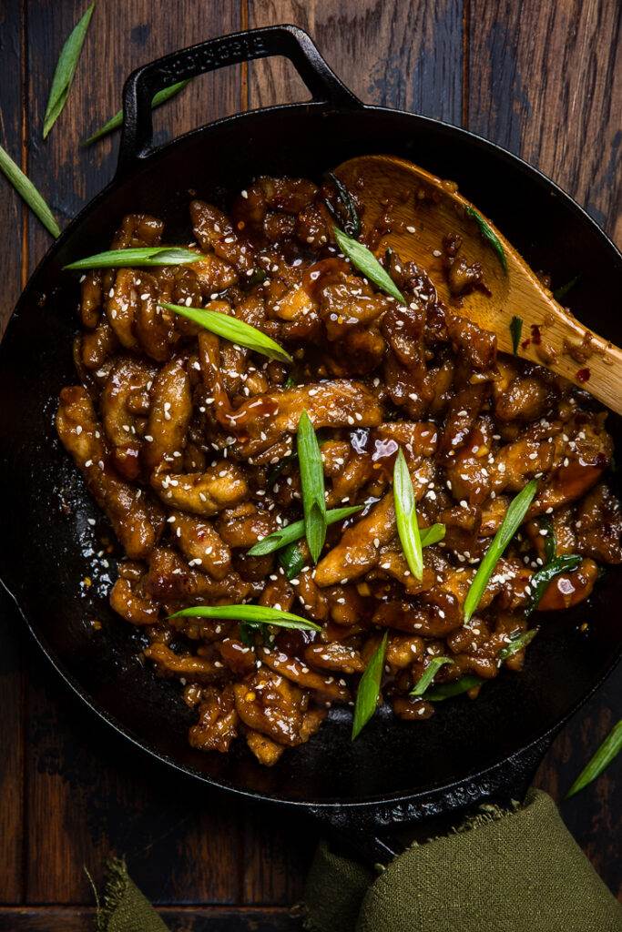 Vegan Mongolian beef made with soy curls and green onions.