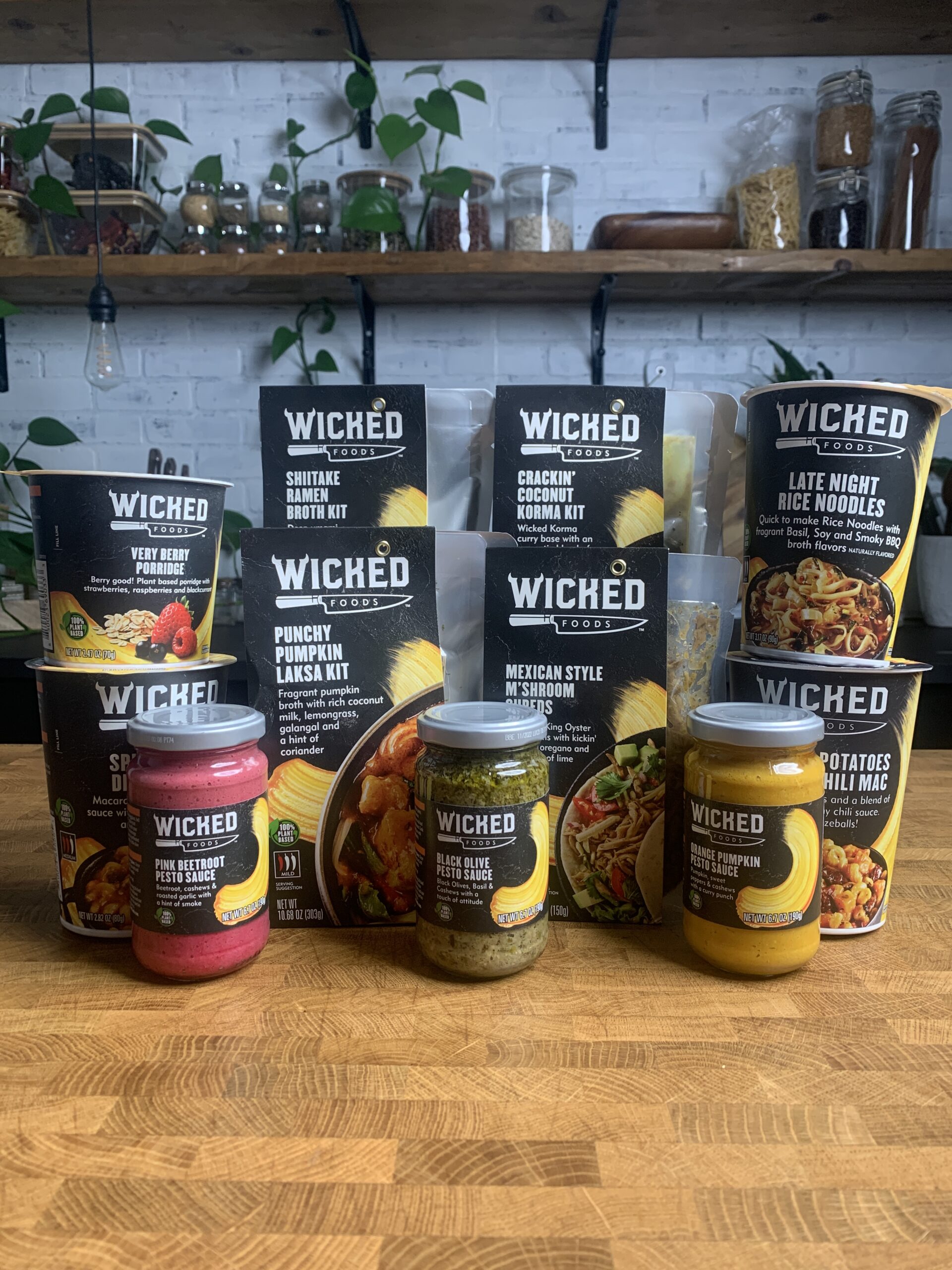 An collection of 11 Wicked Kitchen plant-based foods packages. 
