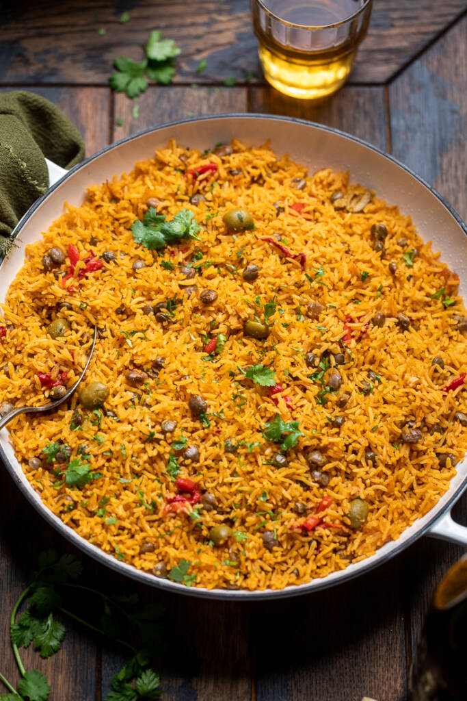 A serving platter of cooked Vegan Puerto Rican Rice.