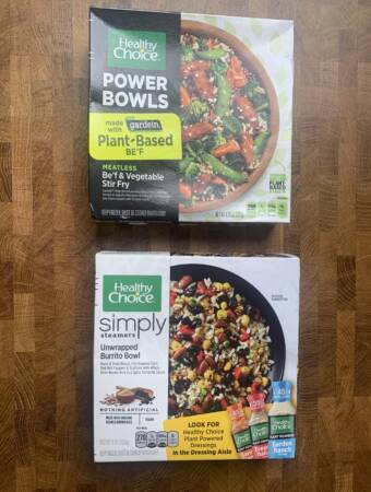 Healthy Choice Power Bowls Be'f & vegetable stir fry and unwrapped burrito bowl packages.