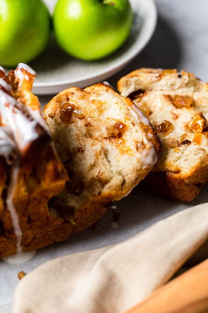 Two slices of Vegan apple pull apart bread. 