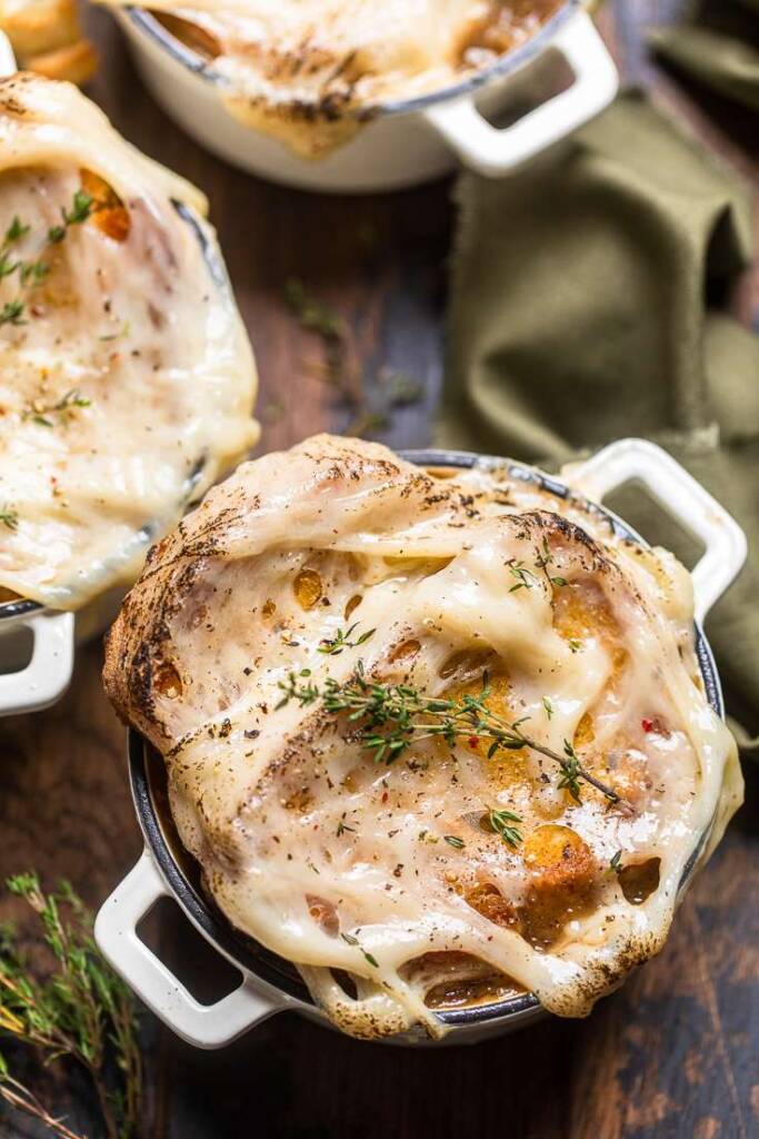 The top of vegan French onion soup with super melty cheese. 