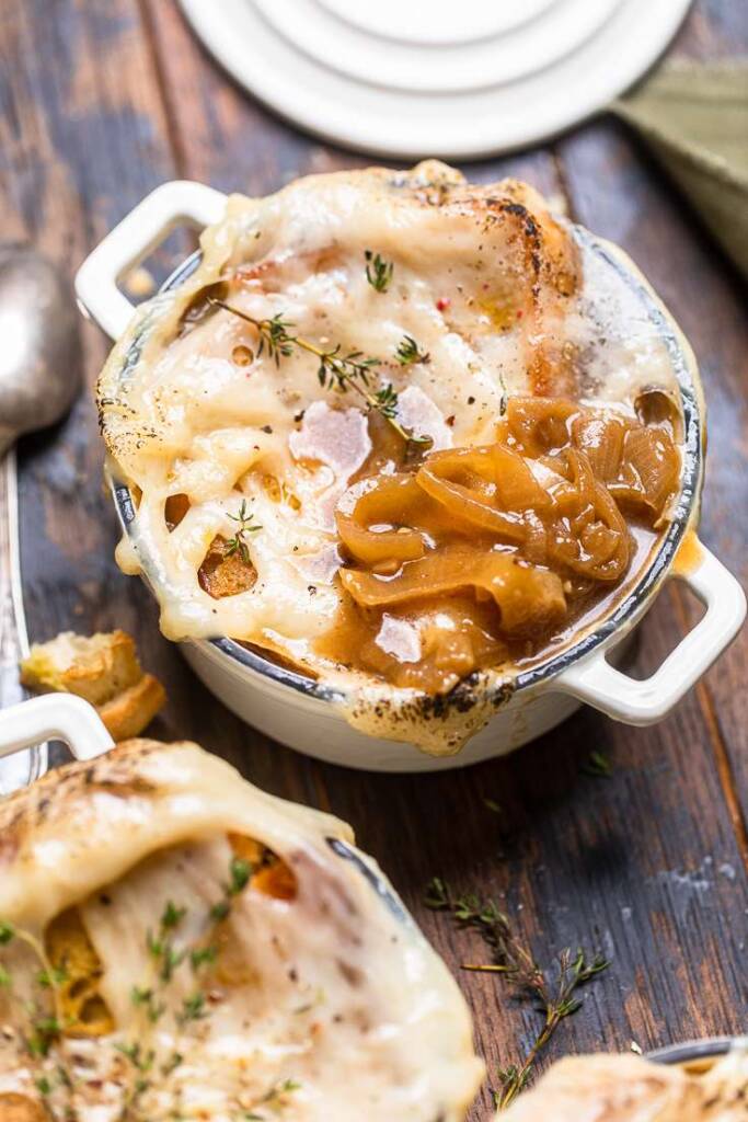Vegan French onion soup with caramelized onions laying on top. 