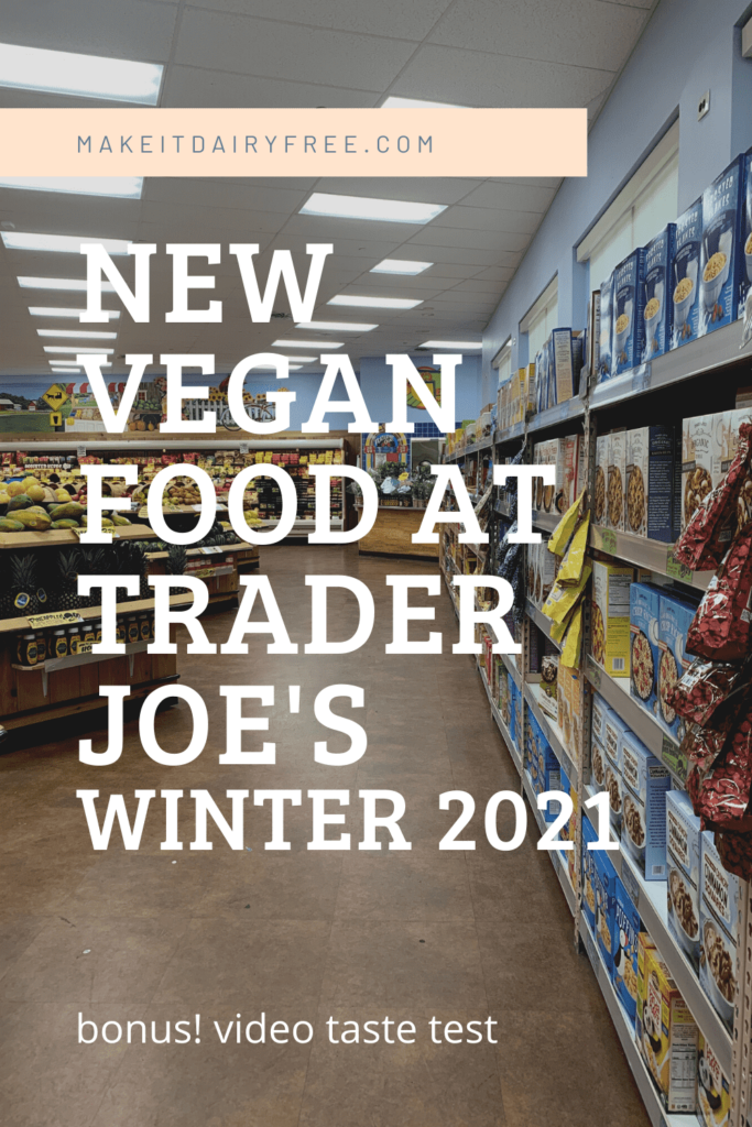 The words new vegan food at Trader Joe\'s winter 2021 overlayed on a aisle of store.