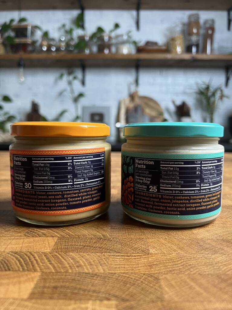 2 jars of Siete dairy free queso with nutritional and ingredient labels. 