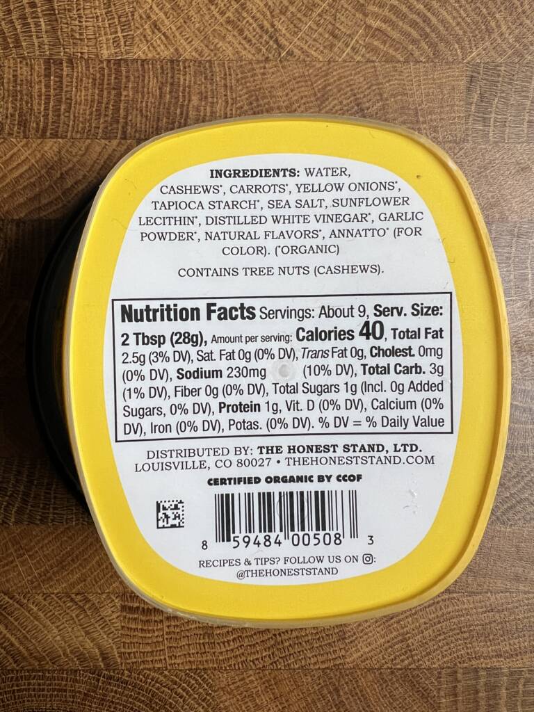 The honest stand classic cheddar cheese plant-based dip nutritional and ingredient label. 