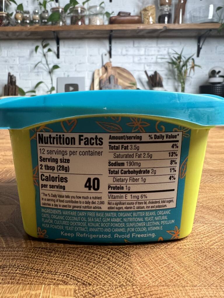 A container of Wayfare dairy free cheese dip nutritional and ingredient label. 