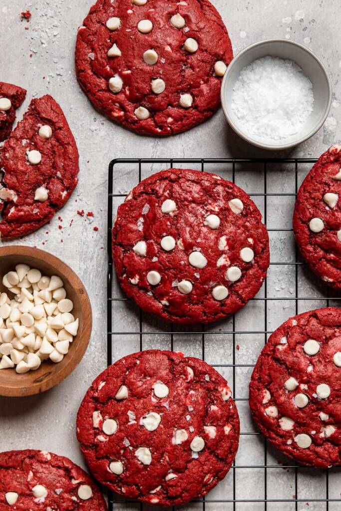 Vegan red velvet cookies with vegan white chocolate chips in a brown bowl. 