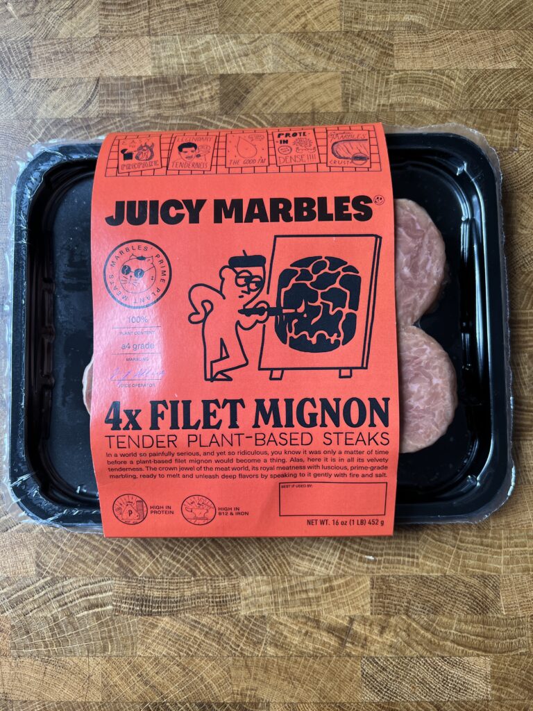 A sealed package of Juicy Marbles vegan filet mignon.
