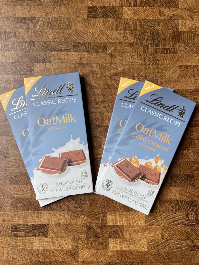 vegan Lindt Oat Milk chocolate bars in packages. 