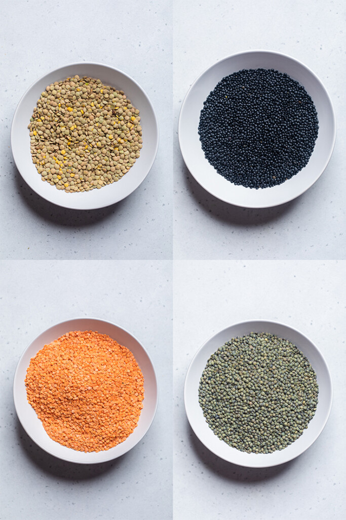 An assortment of lentils sorted into bowls.