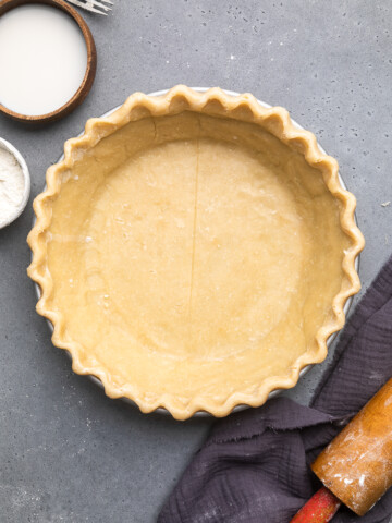 vegan pie crust with scalloped edges.