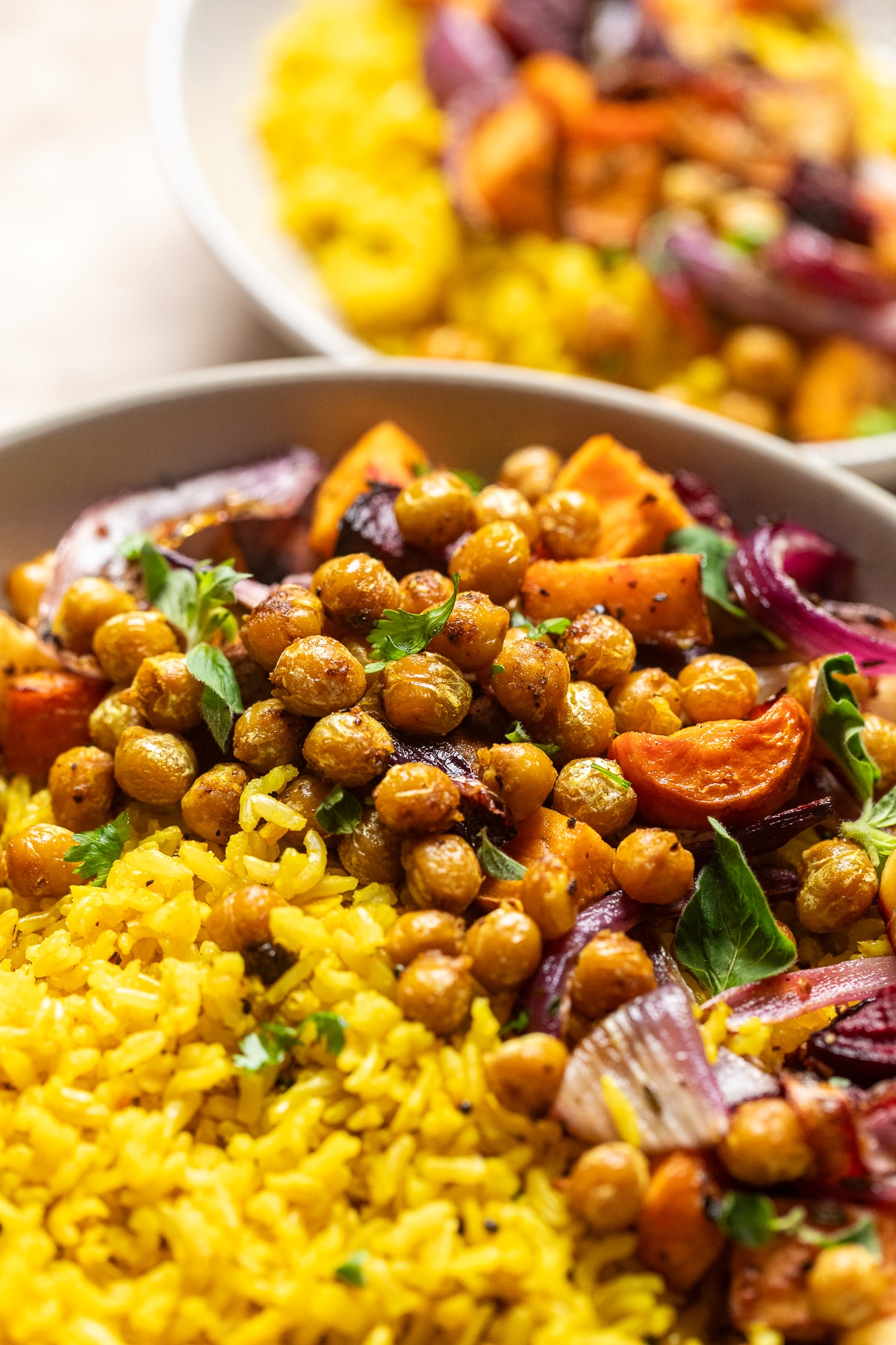 close up of spiced chickpeas and roasted vegetables.