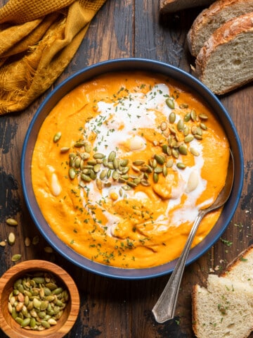 a bowl of red pepper sweet potato soup.