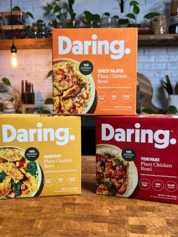 daring foods frozen meal packages on a table.