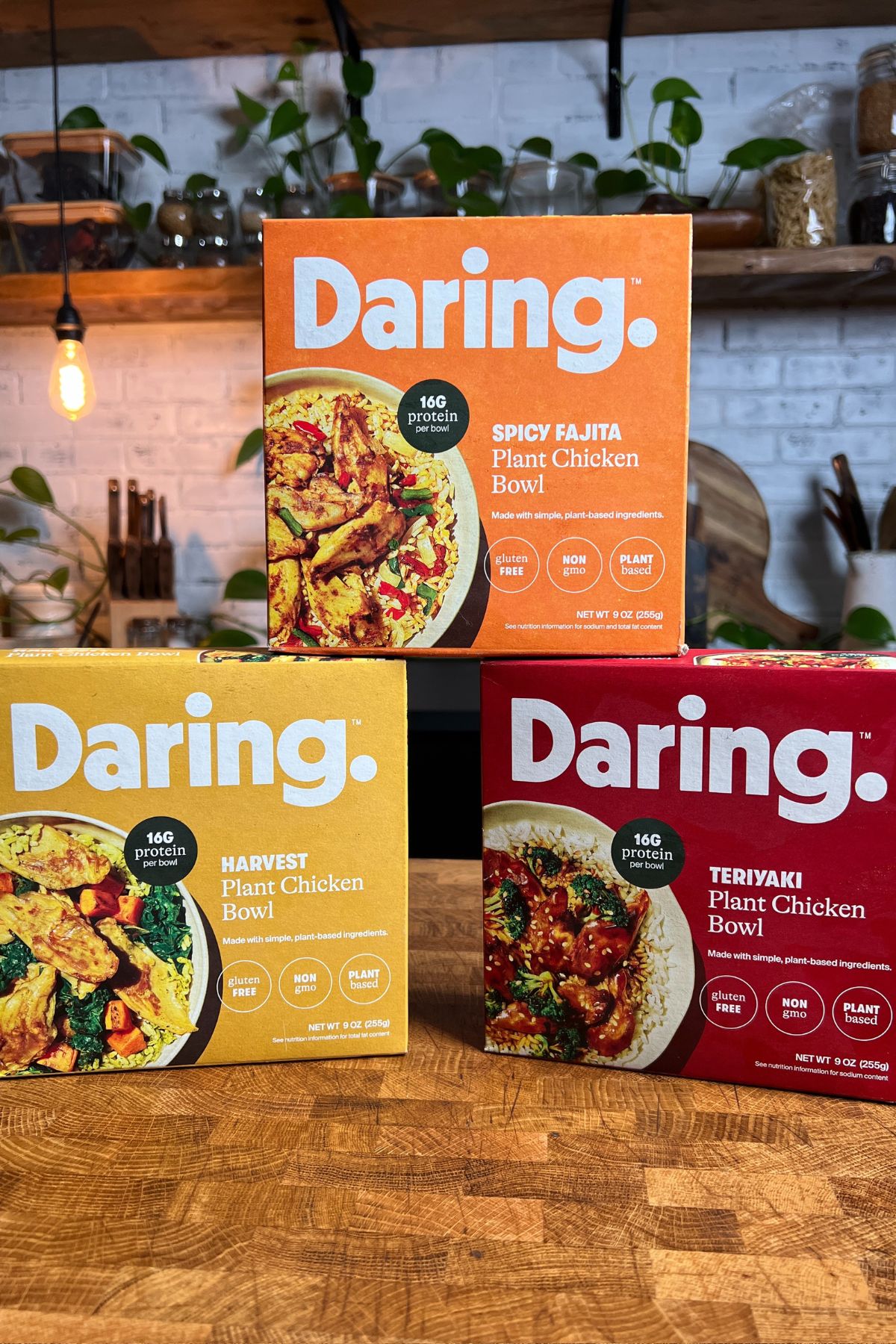 daring foods frozen meal packages on a table. 