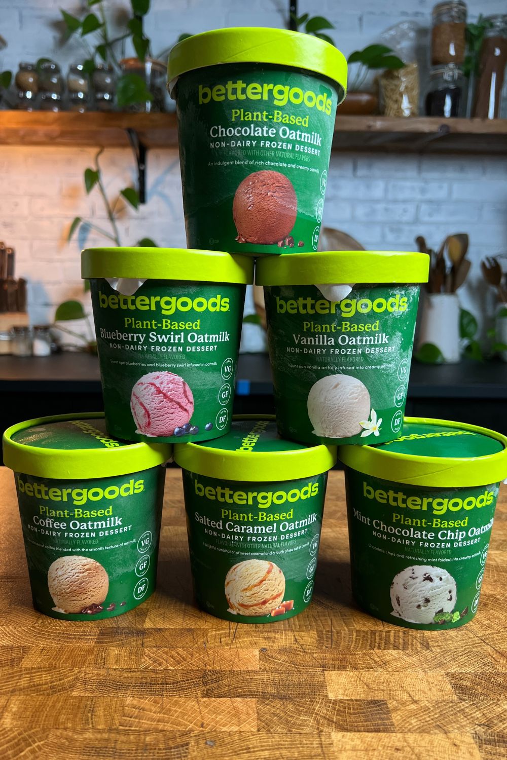 six pints of bettergoods vegan ice cream stacked on a table in a triangle pattern. 