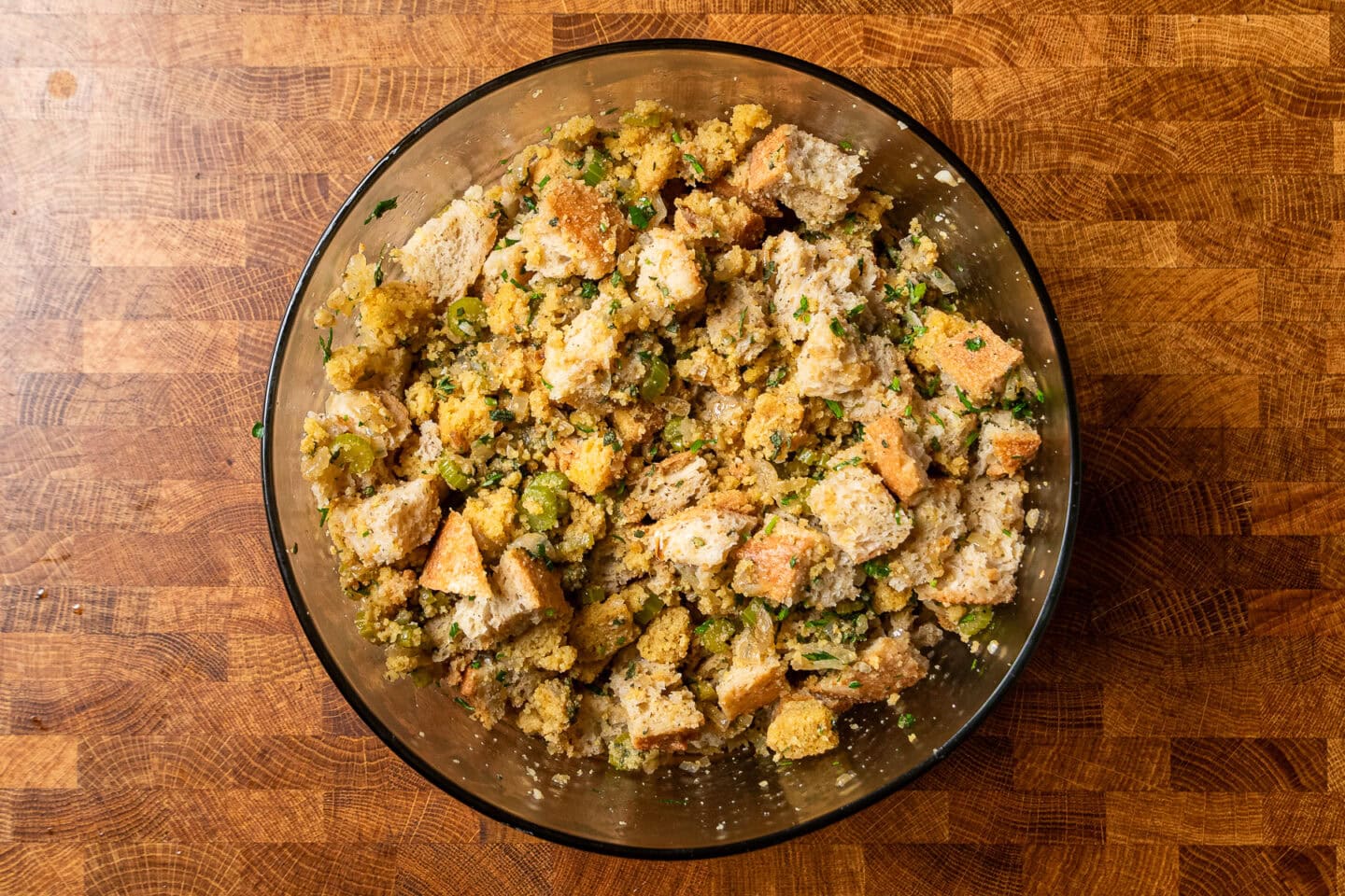 cornbread and sourdough stuffing in a glass bowl.