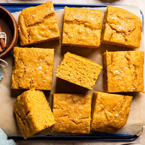 cut pieces of cornbread on a slice of parchment paper.