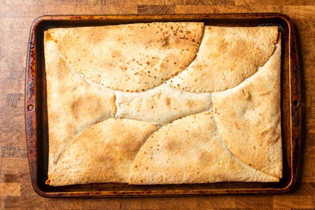a cooked vegan sheet pan quesadilla in a baking tray.