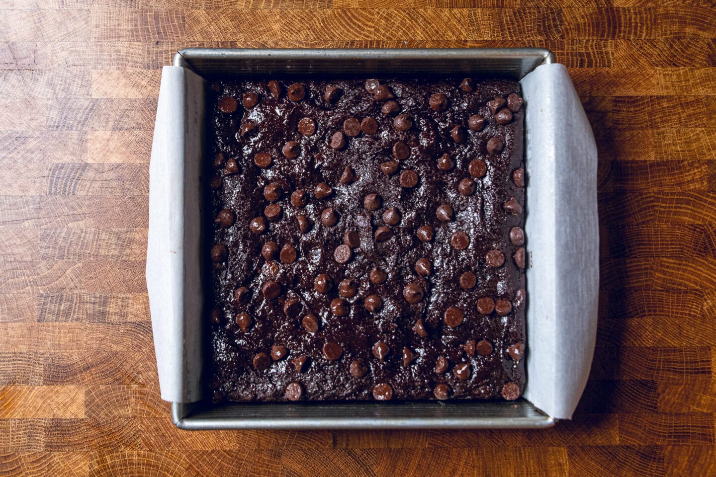 sweet potato brownies baked in a square pan.