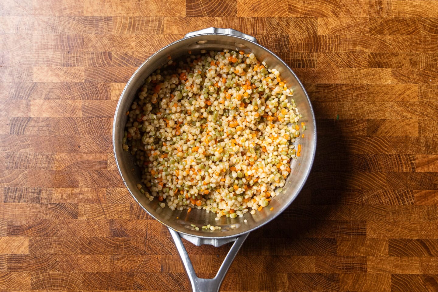 cooked pearl couscous in a pot.