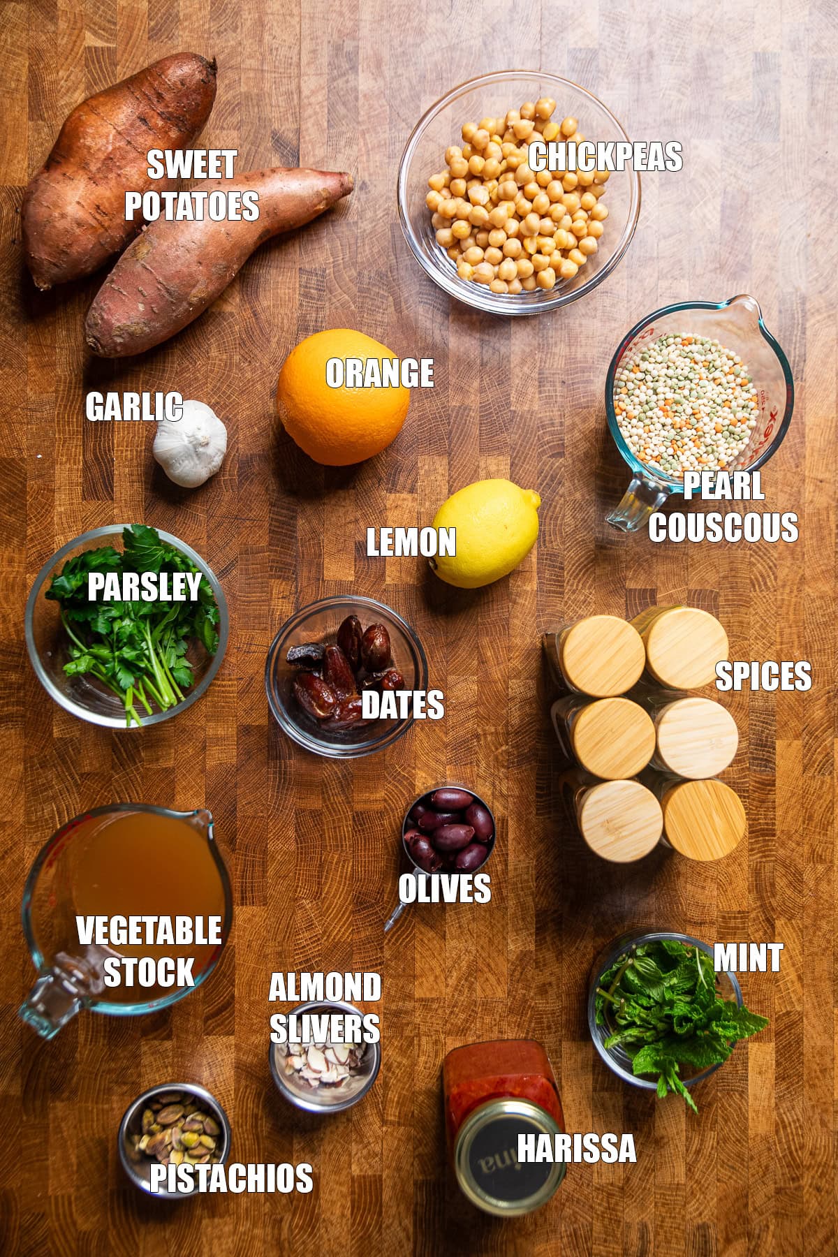ingredients on a table to make a moroccan-spiced couscous salad.