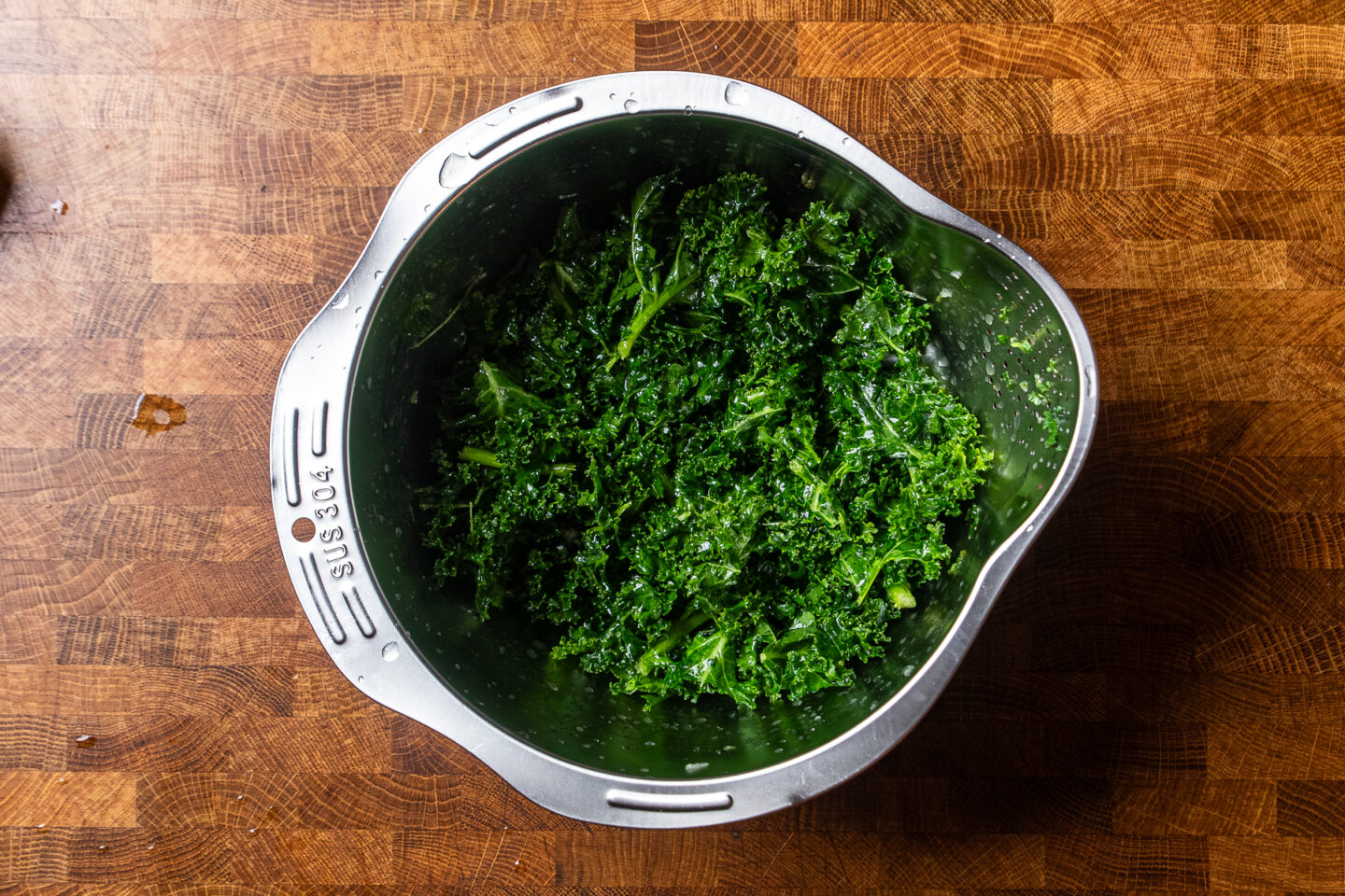 massaged kale in a bowl.