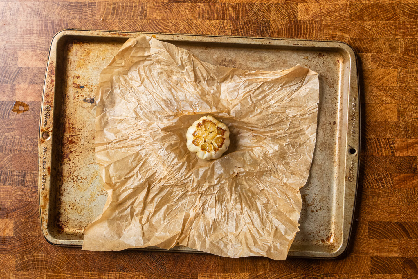 roasted garlic on a parchment lined baking tray.