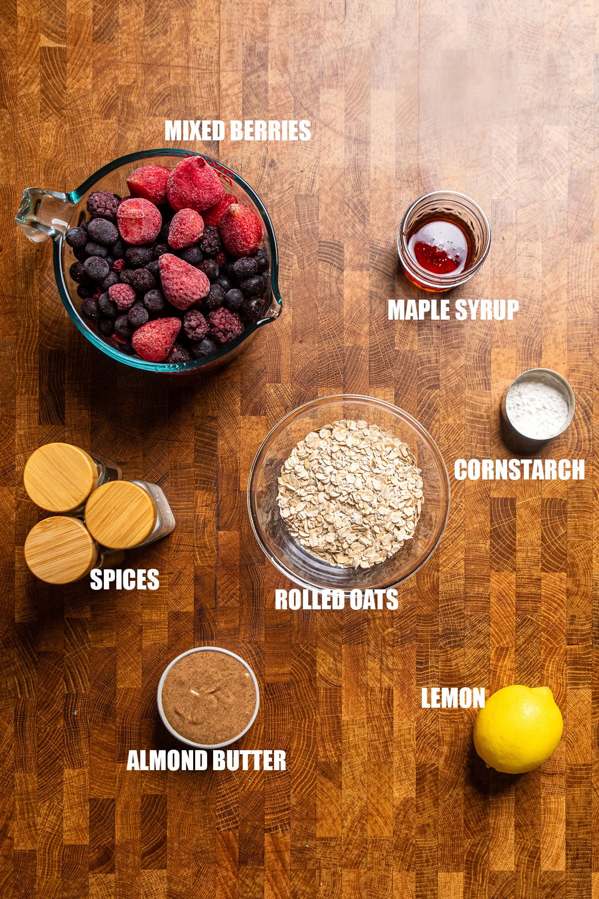 ingredients on a table to make mixed berry crumble.