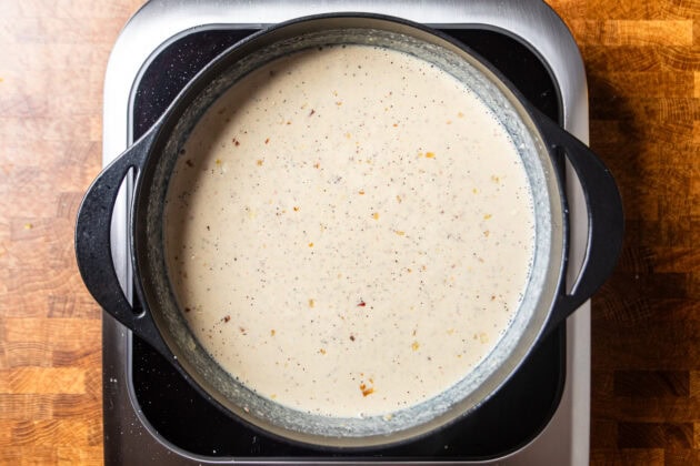 a garlic lemon pepper sauce cooking in a skillet.