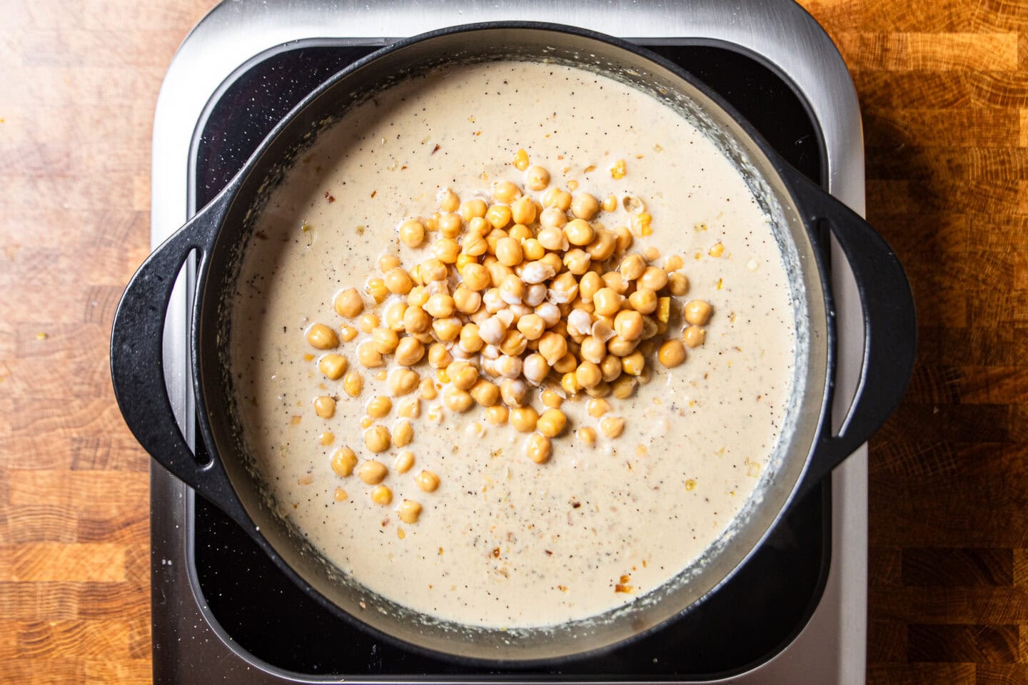 chickpeas added to a garlic lemon pepper sauce.