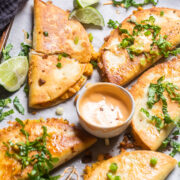 a baking sheet filled with crispy buffalo ranch chickpea tacos.