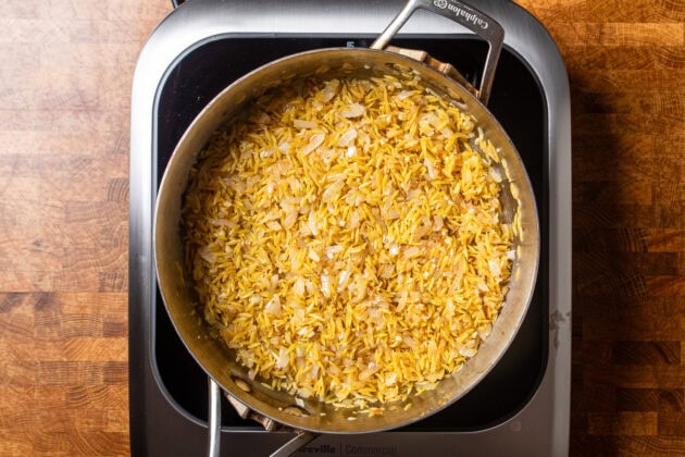 dried orzo and sauteed onions in a skillet before any liquid is added.