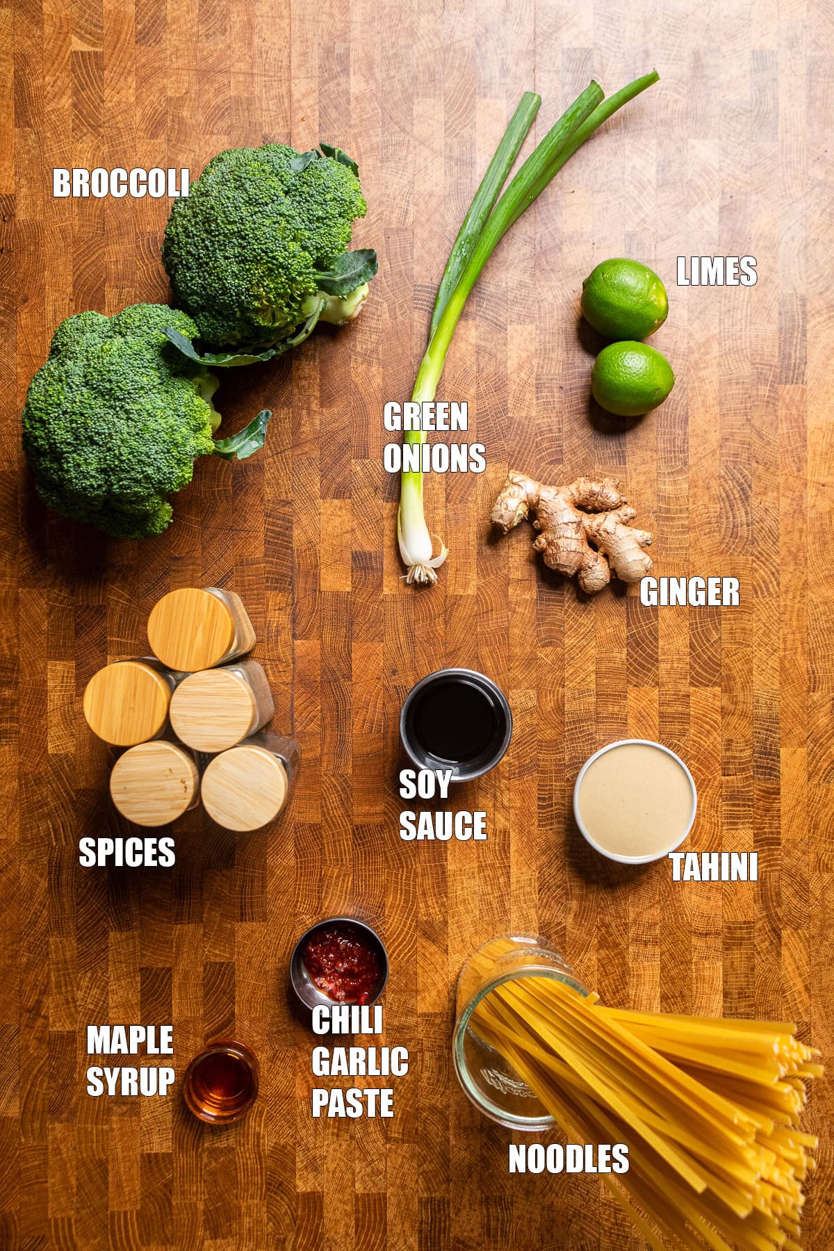 ingredients on a table to make smokey chili lime tahini broccoli noodles.