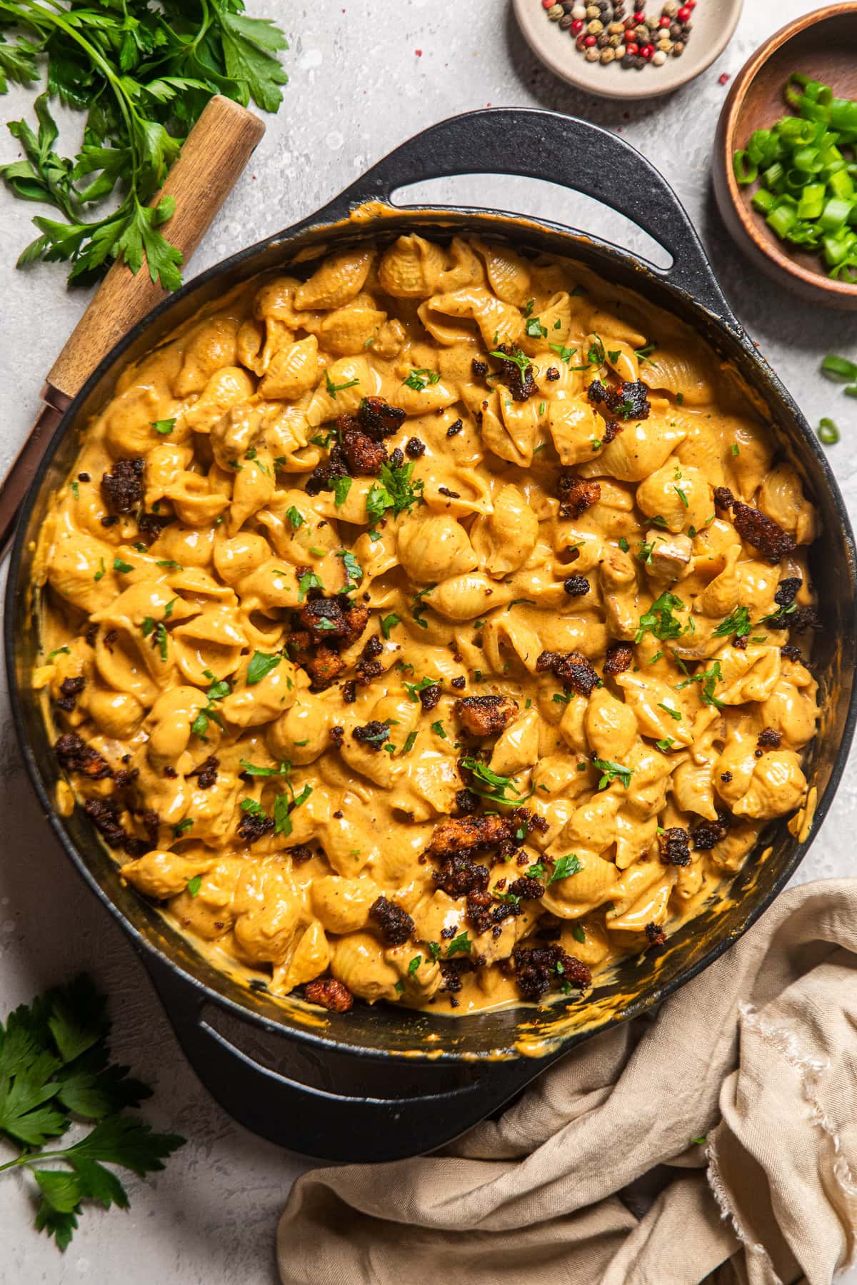 vegan hamburger helper in a cast iron skillet on a table.