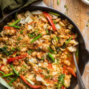 a skillet of hot "honey" cabbage with butter beans and bread crumbs.
