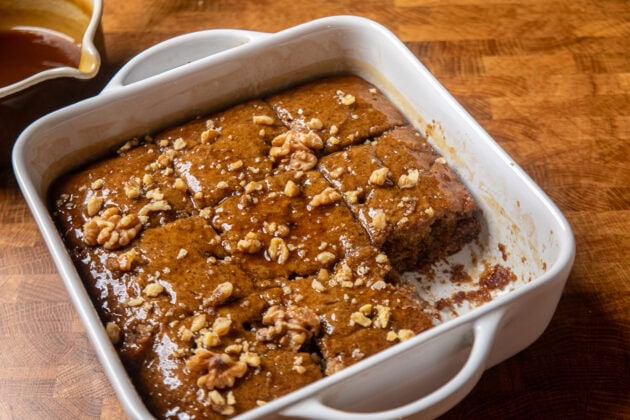 finished toffee pudding topped with chopped walnuts.